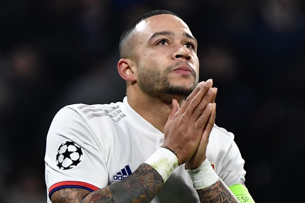 Lyonu00e2u20acu2122s Memphis Depay celebrates after scoring a goal during the Uefa Champions League Group G match with RB Leipzig at the Parc Olympique Lyonnais stadium in Decines-Charpieu near Lyon December 10, 2019. u00e2u20acu201d AFP pic