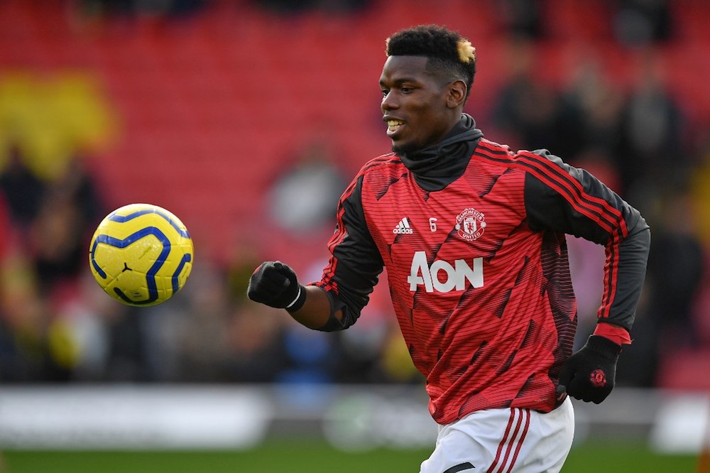 Manchester Unitedu00e2u20acu2122s Paul Pogba warms up ahead of the Premier League match with Watford at Vicarage Road Stadium in Watford December 22, 2019. u00e2u20acu201d AFP pic