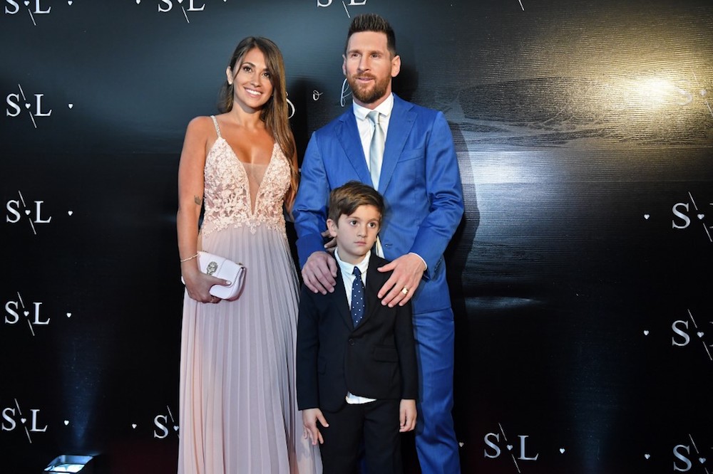 Lionel Messi poses with his wife Antonella Roccuzzo and their son Thiago upon their arrival at a party thrown by Luis Suarez for the renewal of his marriage vows in La Barra, near Punta del Este, Uruguay, December 26, 2019. — AFP pic