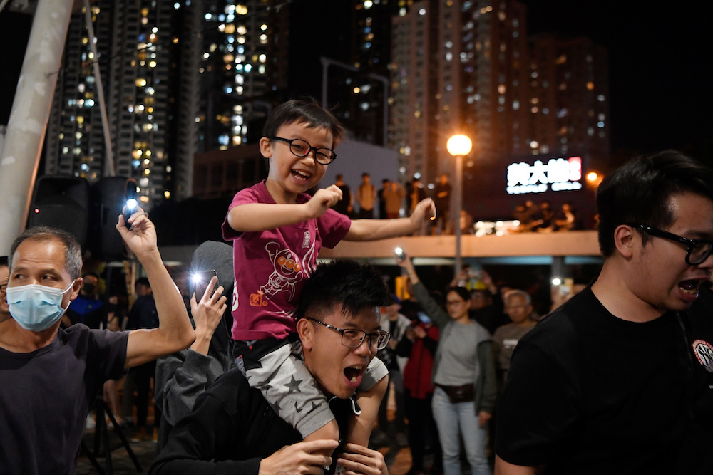 People celebrate the results of last week's district council elections in the neighbourhood of Wong Tai Sin in Hong Kong November 30, 2019. u00e2u20acu201d Reuters pic