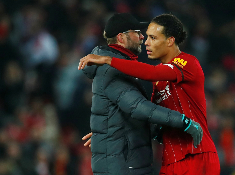 Liverpool manager Juergen Klopp and Virgil van Dijk celebrate after the match at Anfield, Liverpool November 30, 2019. u00e2u20acu201d Reuters pic 