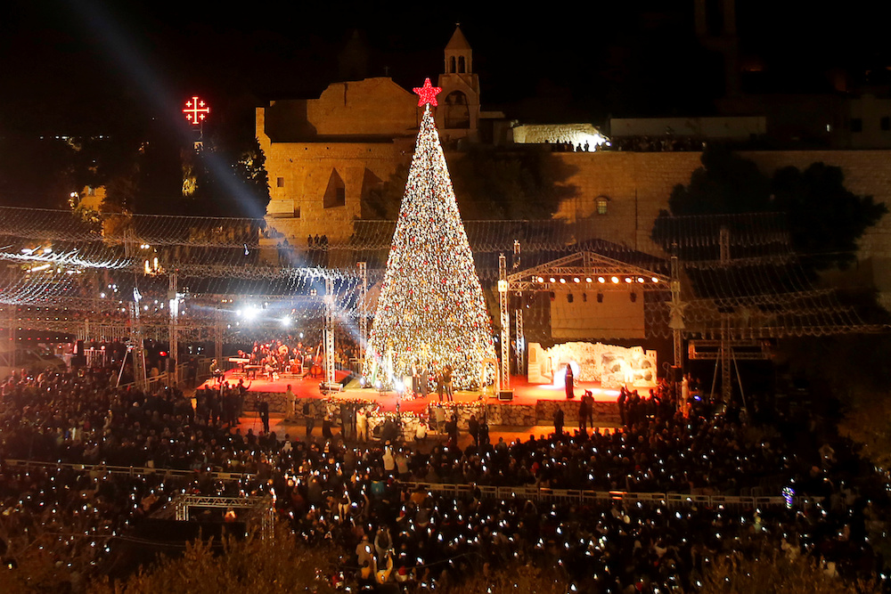 Palestinians light a Christmas tree in Manger Square outside the Church of the Nativity in Bethlehem November 30, 2019. u00e2u20acu201d Reuters pic