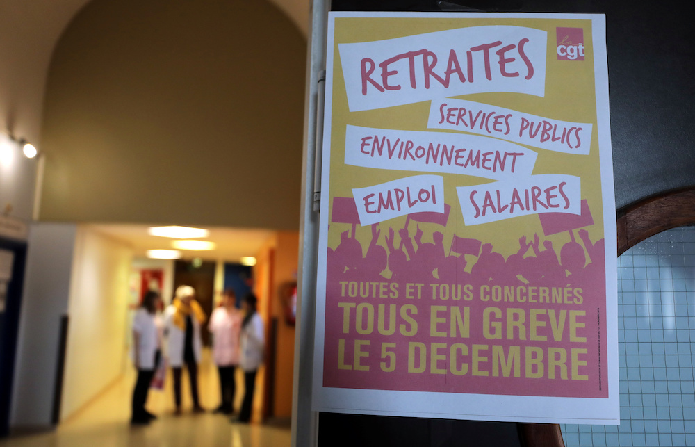 A poster that reads u00e2u20acu02dcAll on strike on December 5u00e2u20acu2122 is seen in a corridor of l'Archet hospital, on the eve of a national strike against French government's pensions reform plans, in Nice December 4, 2019. u00e2u20acu201d Reuters pic