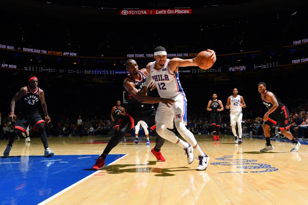 Tobias Harris of the Philadelphia 76ers handles the ball against Serge Ibaka of the Toronto Raptors at the Wells Fargo Centre in Philadelphia, Pennsylvania December 8, 2019. u00e2u20acu201d AFP pic
