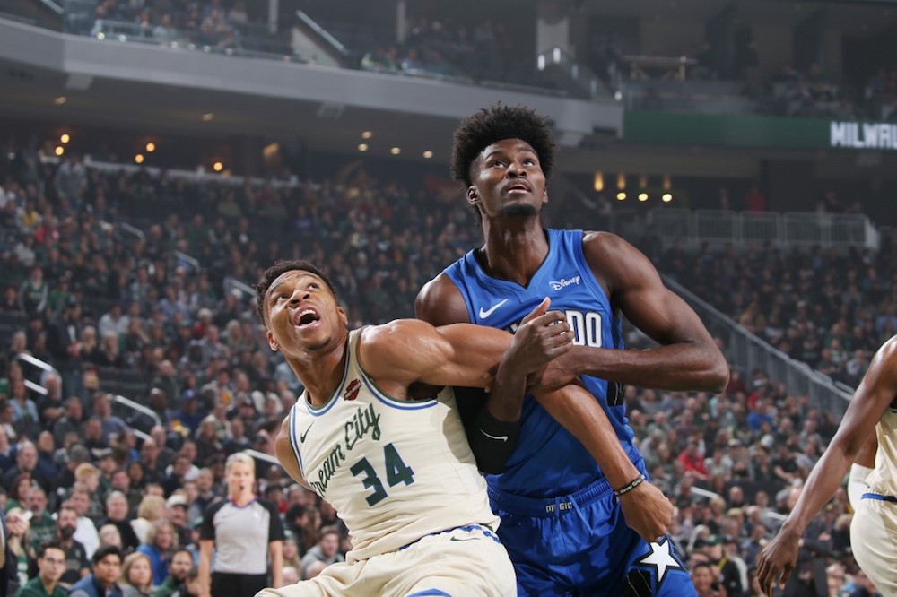 Giannis Antetokounmpo of the Milwaukee Bucks and Jonathan Isaac of the Orlando Magic fight for position at the Fiserv Forum Centre in Milwaukee, Wisconsin December 9, 2019. u00e2u20acu201d AFP pic