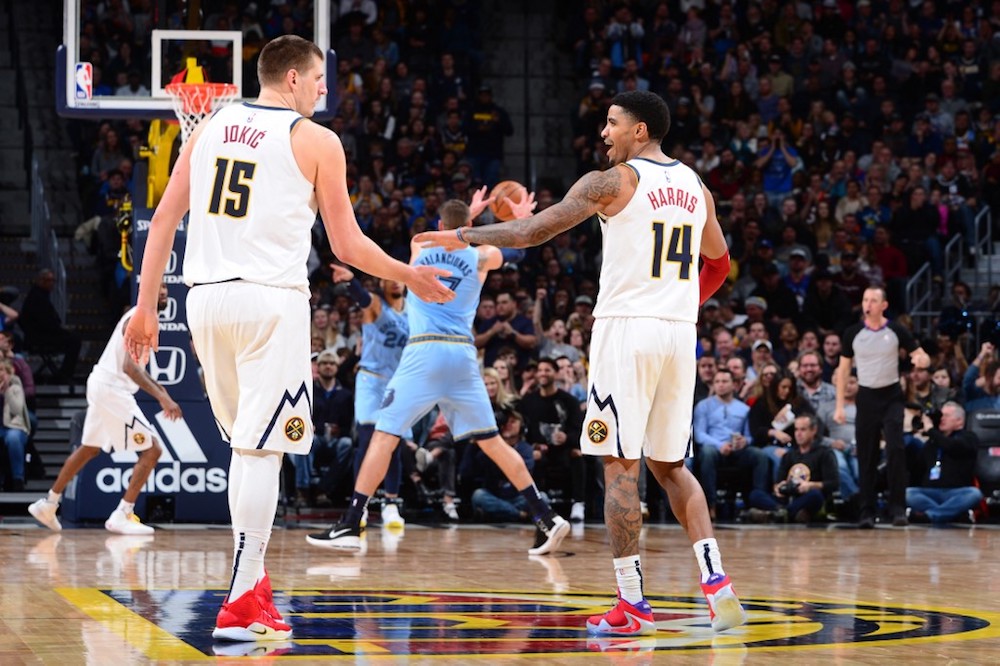 Nikola Jokic of the Denver Nuggets high-fives Gary Harris of the Denver Nuggets against the Memphis Grizzlies at the Pepsi Centre in Denver, Colorado December 28, 2019. u00e2u20acu201d AFP pic