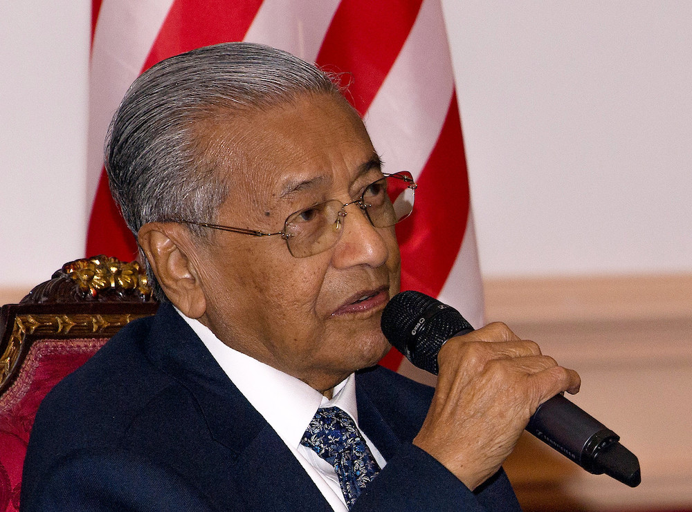 Prime Minister Tun Dr Mahathir Mohamad during a dialogue session at a dinner with the Malaysian diaspora in Qatar December 13, 2019. u00e2u20acu201d Bernama pic