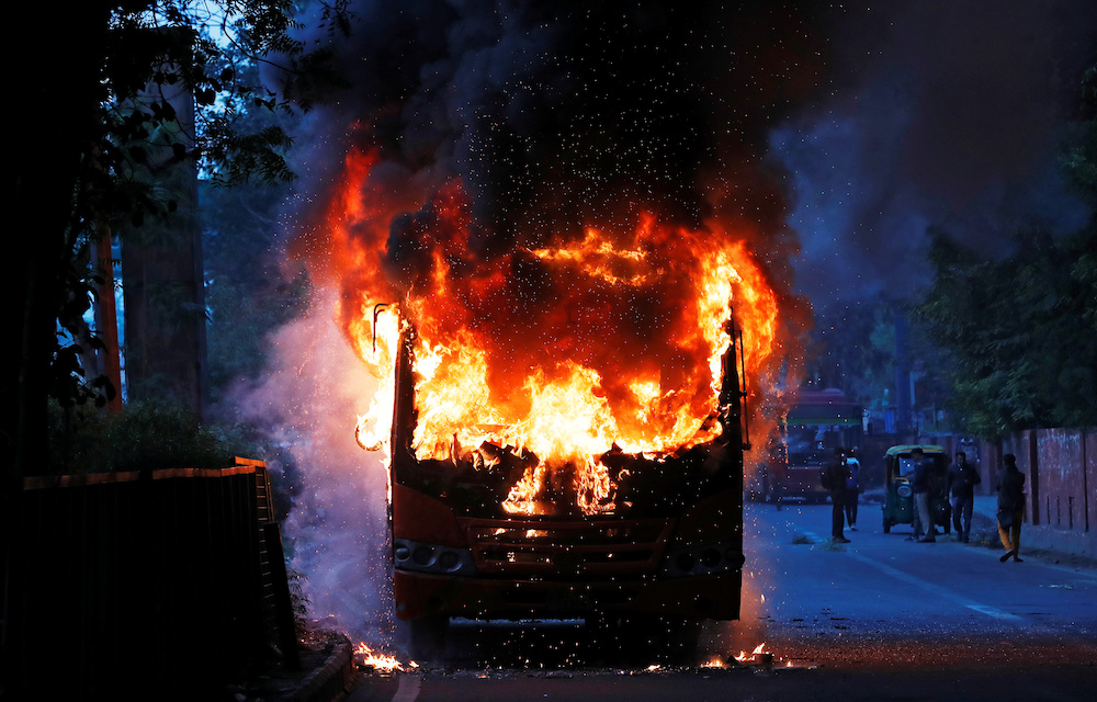 A passenger bus burns after it was set on fire by demonstrators during a protest against a new citizenship law, in New Delhi December 15, 2019. u00e2u20acu201d Reuters pic