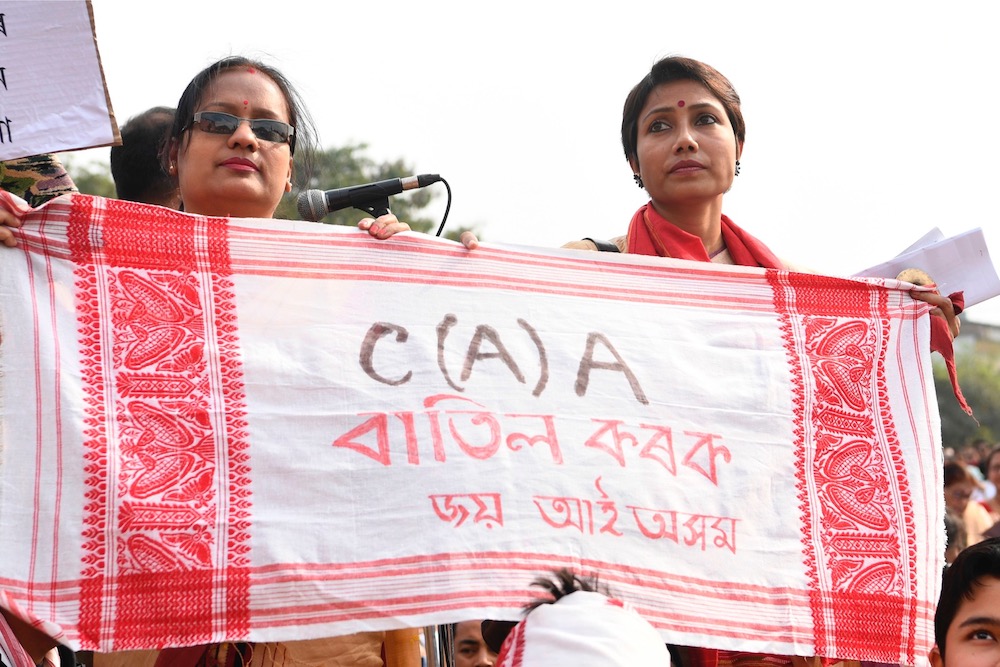Demonstrators take part in a musical concert to protest against Citizen Ammendent Act (CAB) in Guhawati December 15, 2019. — AFP pic