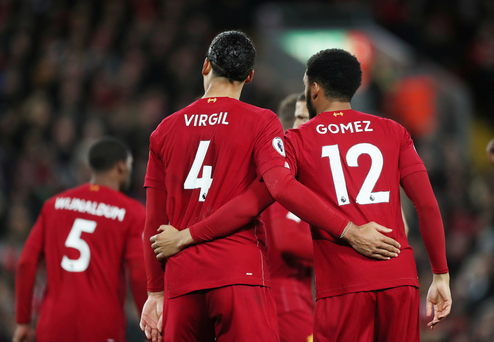 Liverpoolu00e2u20acu2122s Virgil van Dijk with Joe Gomez during the Premier League match with Everton at Anfield in Liverpool December 4, 2019. u00e2u20acu201d Action Images pic via Reuters