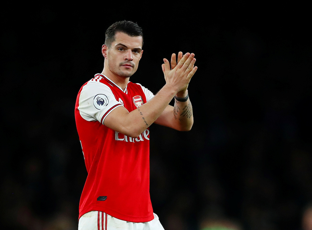 Arsenalu00e2u20acu2122s Granit Xhaka applauds fans after the Premier League match with Brighton and Hove Albion at Emirates Stadium in London December 5, 2019. u00e2u20acu201d Reuters pic