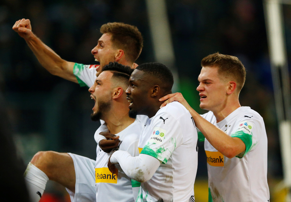 Borussia Moenchengladbachu00e2u20acu2122s Ramy Bensebaini celebrates scoring their second goal with teammates during the Bundesliga match with Bayern Munich at Borussia-Park in Moenchengladbach December 7, 2019. u00e2u20acu201d Reuters pic