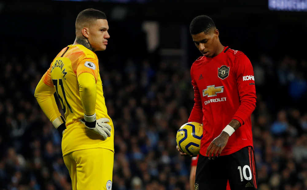 Manchester United’s Marcus Rashford prepares to take a penalty as Manchester City’s Ederson looks on during their Premier League match at Etihad Stadium in Manchester December 7, 2019. — Reuters pic