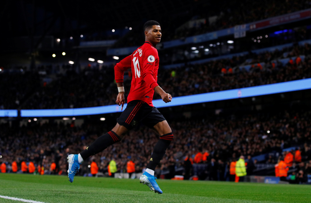 Manchester United’s Marcus Rashford celebrates scoring their first goal during the Premier League with Manchester City at Etihad Stadium in Manchester December 7, 2019. — Reuters pic