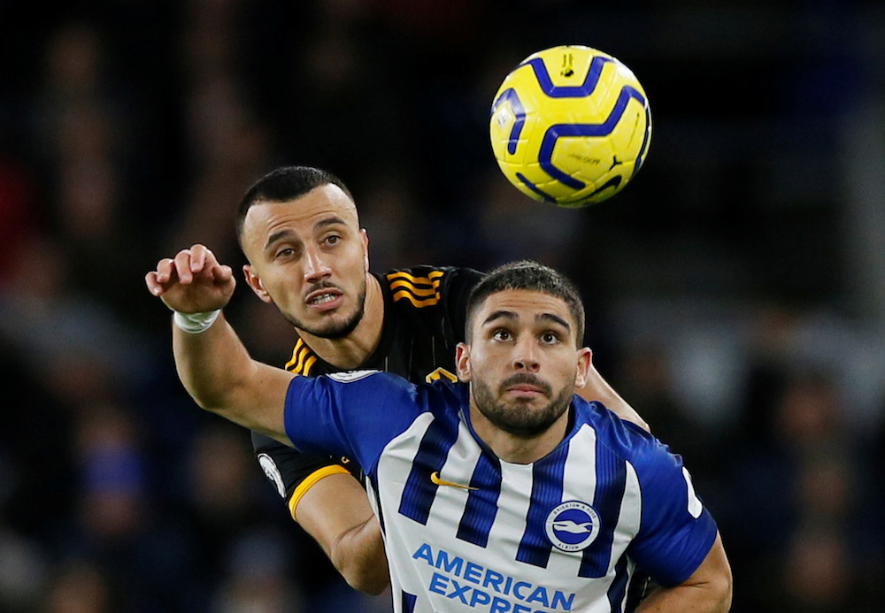 Brighton and Hove Albion’s Neal Maupay in action with Wolverhampton Wanderers’ Romain Saiss during their Premier League match at The American Express Community Stadium in Brighton December 8, 2019. — Reuters pic