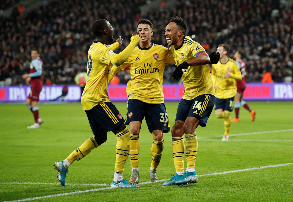 Arsenalu00e2u20acu2122s Pierre-Emerick Aubameyang celebrates scoring their third goal with teammates Nicolas Pepe and Gabriel Martinelli during the Premier League match with West Ham at London Stadium in London December 9, 2019. u00e2u20acu201d Reuters pic