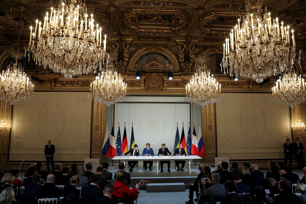 Ukrainian President Volodymyr Zelenskiy, German Chancellor Angela Merkel, French President Emmanuel Macron and Russian President Vladimir Putin give a press conference after a summit on Ukraine in Paris December 9, 2019. u00e2u20acu201d Reuters pic