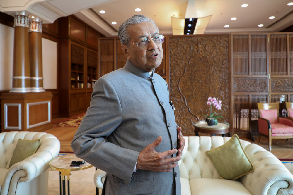 Malaysia’s Prime Minister Tun Dr Mahathir Mohamad reacts during an interview with Reuters in Putrajaya December 10, 2019. — Reuters pic