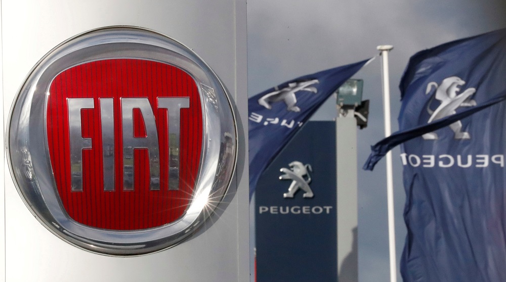 The logos of car manufacturers Fiat and Peugeot are seen in front of dealerships of the companies in Saint-Nazaire, France November 8, 2019. u00e2u20acu201d Reuters pic