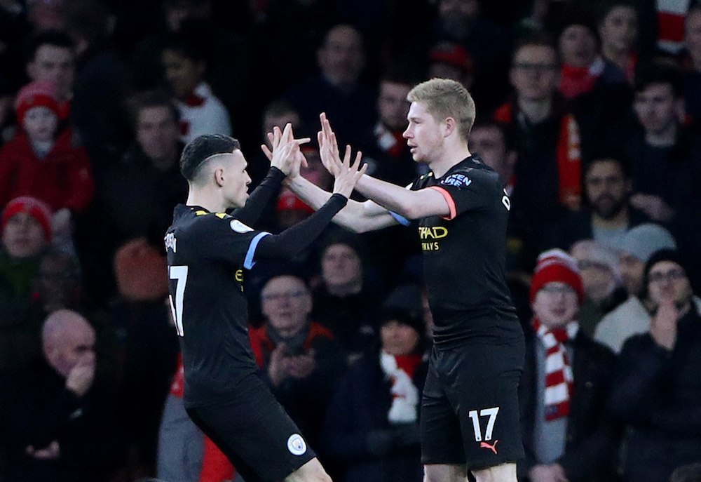 Manchester Cityu00e2u20acu2122s Kevin De Bruyne celebrates scoring their first goal with teammate Phil Foden during the Premier League match with Arsenal at Emirates Stadium in London December 15, 2019. u00e2u20acu201d Reuters pic