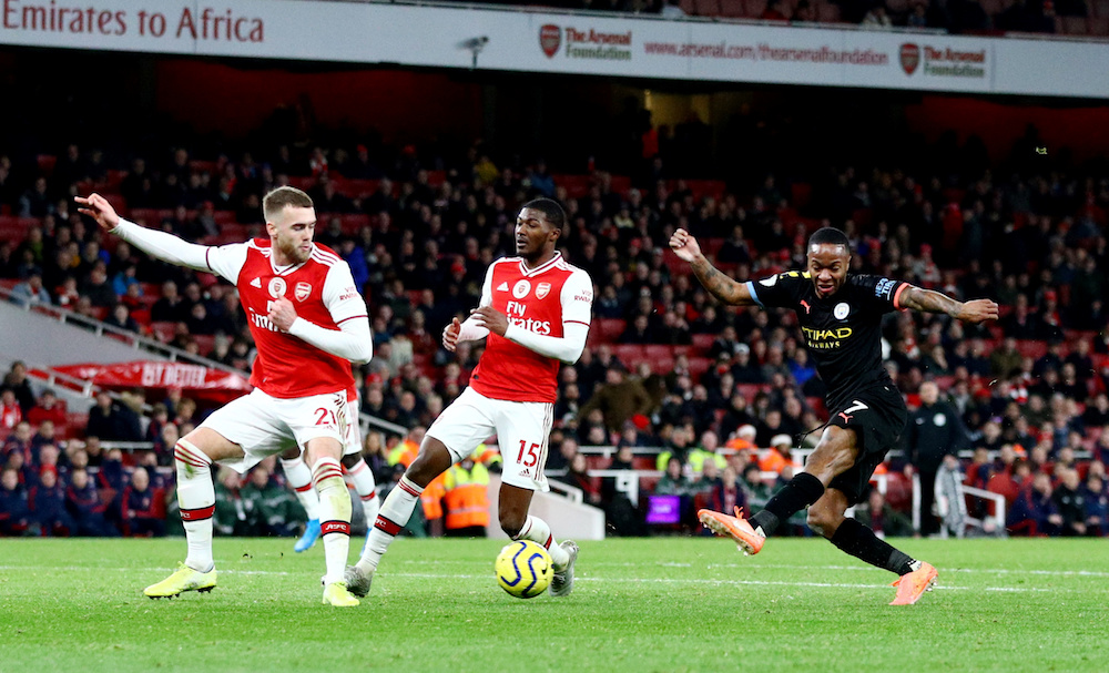 Manchester City’s Raheem Sterling shoots at goal during the Premier League match with Arsenal at Emirates Stadium in London December 15, 2019. — Reuters pic