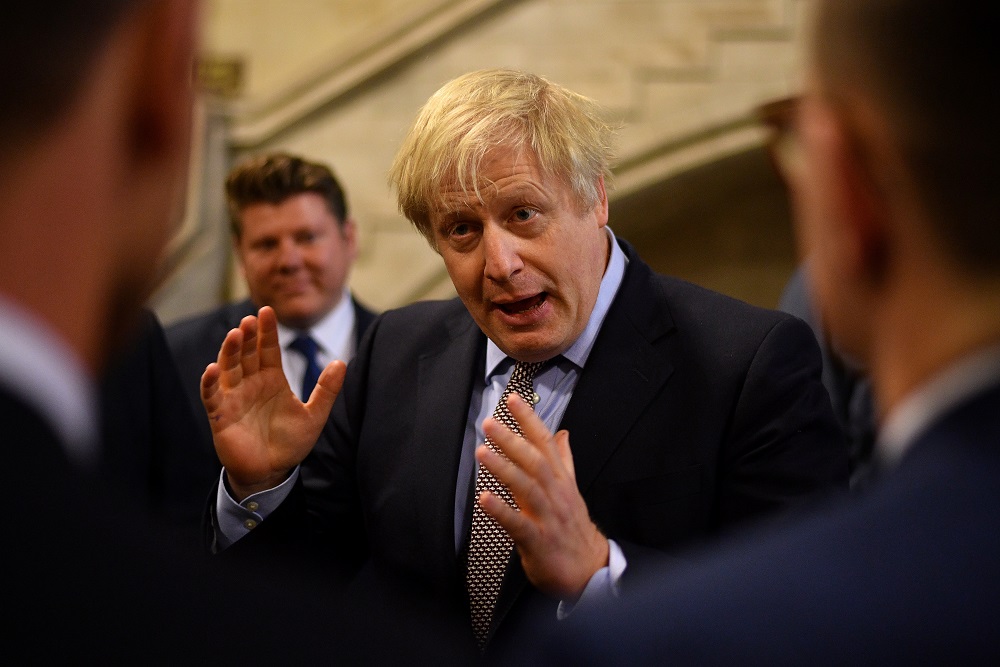 British Prime Minister Boris Johnson talks with newly-elected Conservative MPs at the Houses of Parliament, London December 16, 2019. u00e2u20acu201d Reuters pic