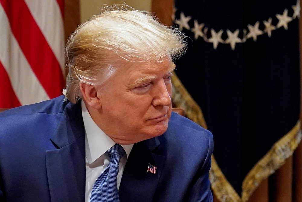 US President Donald Trump listens during a roundtable on deregulation at the White House in Washington December 16, 2019. u00e2u20acu201d Reuters pic