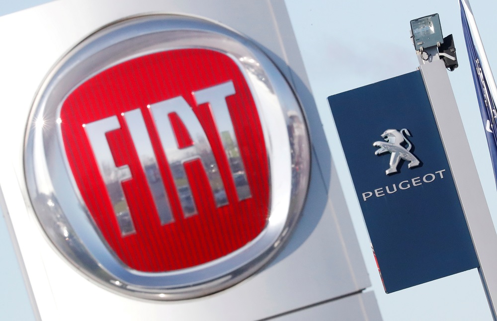 The logos of car manufacturers Fiat and Peugeot are seen in front of dealerships of the companies in Saint-Nazaire, France November 8, 2019. u00e2u20acu201d Reuters pic