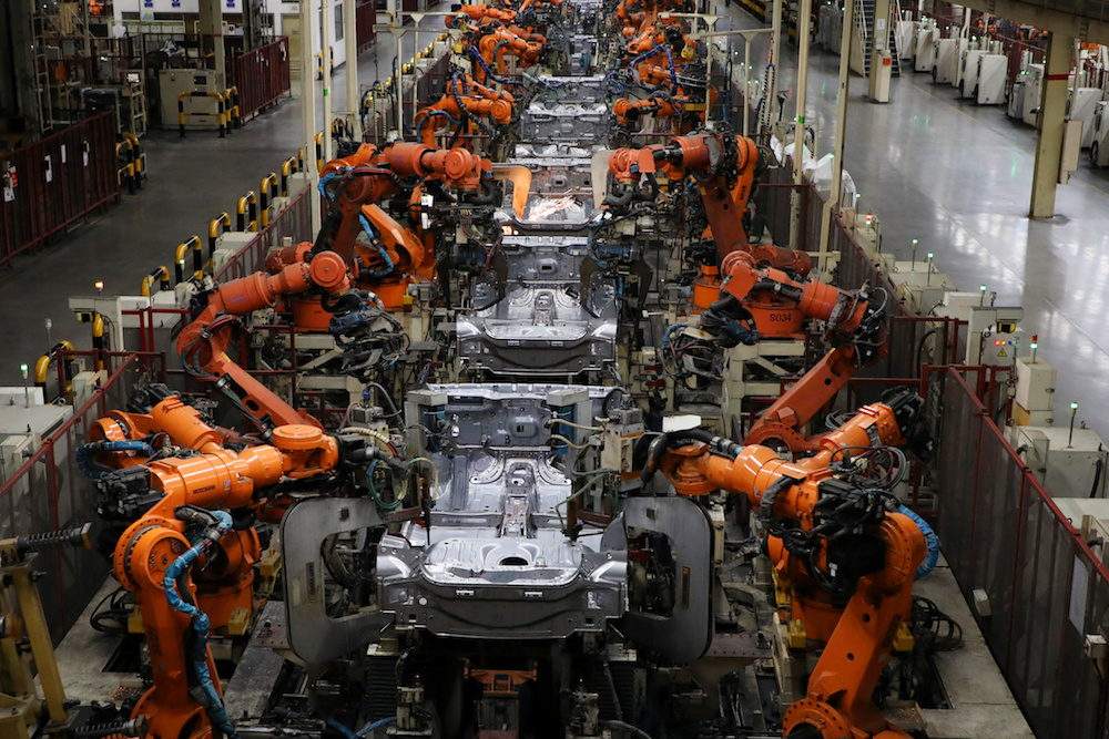 Robots weld bodyshells of car are pictured on the assembly line in the Proton manufacturing plant in Tanjung Malim December 16, 2019. u00e2u20acu201d Reuters pic