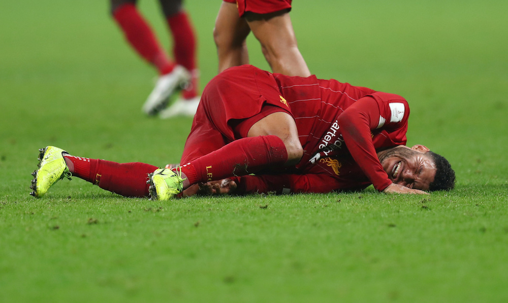 Liverpoolu00e2u20acu2122s Alex Oxlade-Chamberlain goes down injured during the Club World Cup Final with Flamengo at Khalifa International Stadium in Doha December 21, 2019. u00e2u20acu201d Reuters pic
