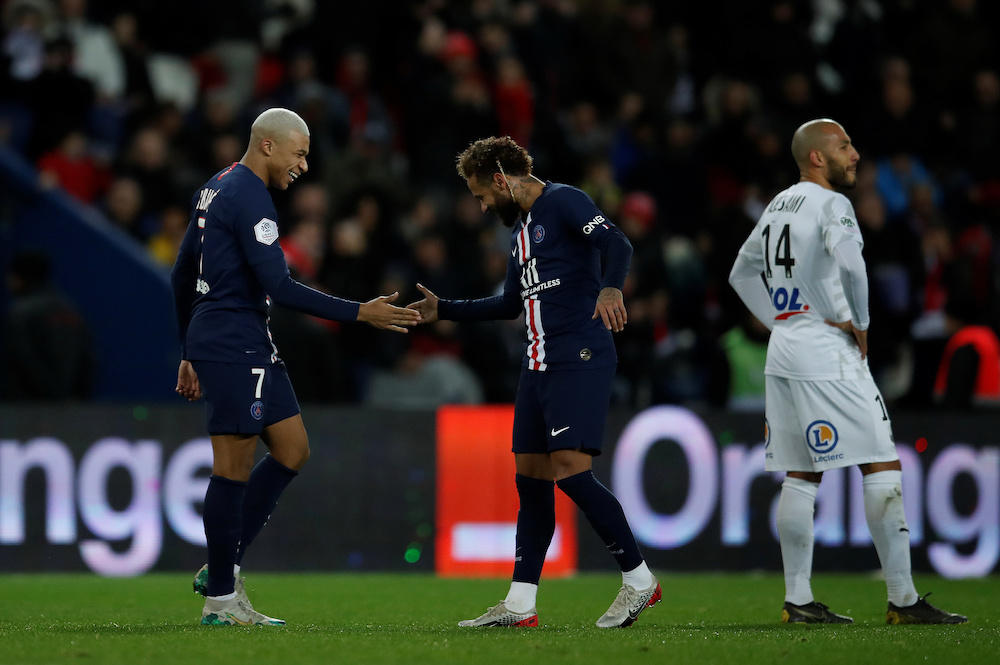 Paris St Germainu00e2u20acu2122s Kylian Mbappe celebrates scoring their third goal with Neymar during the Ligue 1 match with Amiens at Parc des Princes in Paris December 21, 2019. u00e2u20acu201d Reuters pic