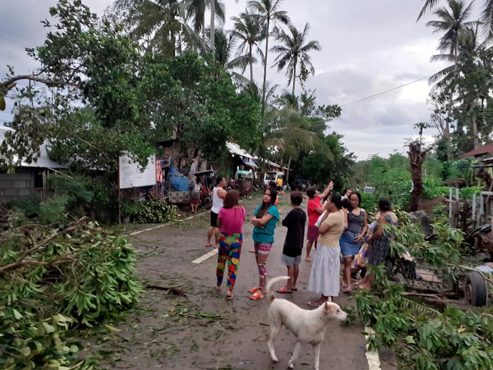 People are seen amongst storm debris in Biliran, Philippines December 26, 2019 in this picture obtained from social media. u00e2u20acu201d Reuters pic