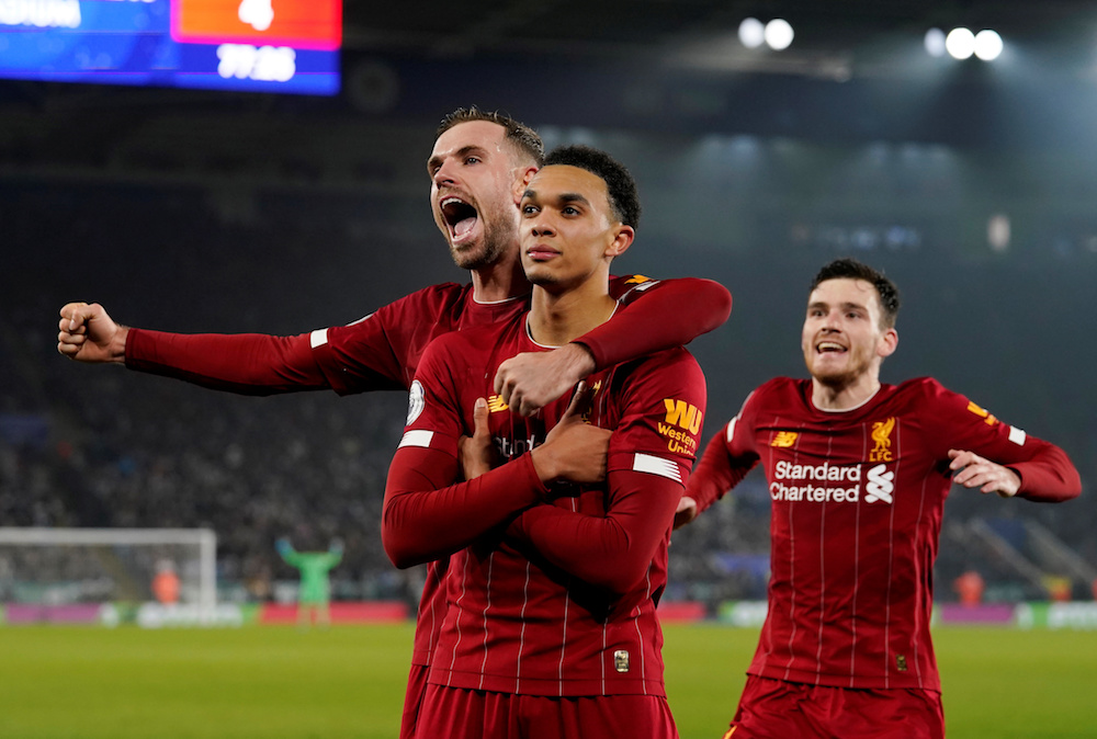 Liverpoolu00e2u20acu2122s Trent Alexander-Arnold celebrates scoring their fourth goal with Jordan Henderson during the Premier League match with Leicester City at King Power Stadium in Leicester December 26, 2019. u00e2u20acu201d Reuters pic