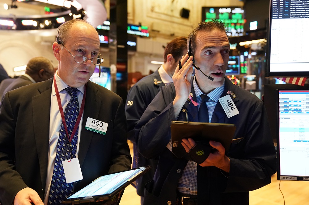 Traders work on the floor at the opening bell of the New York Stock Exchange December 27, 2019. u00e2u20acu201d Reuters pic