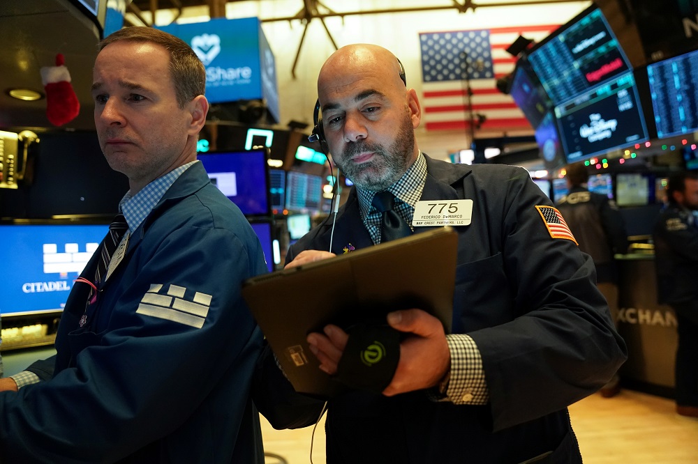Traders work on the floor at the opening bell of the New York Stock Exchange in New York December 27, 2019. u00e2u20acu201d Reuters pic