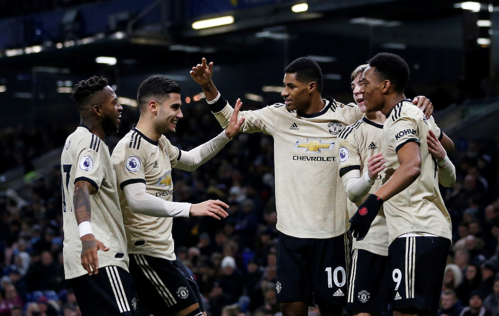 Manchester United’s Anthony Martial celebrates scoring their first goal with teammates during the Premier League match with Burnley at Turf Moor in Burnley December 28, 2019. — Action Images pic via Reuters