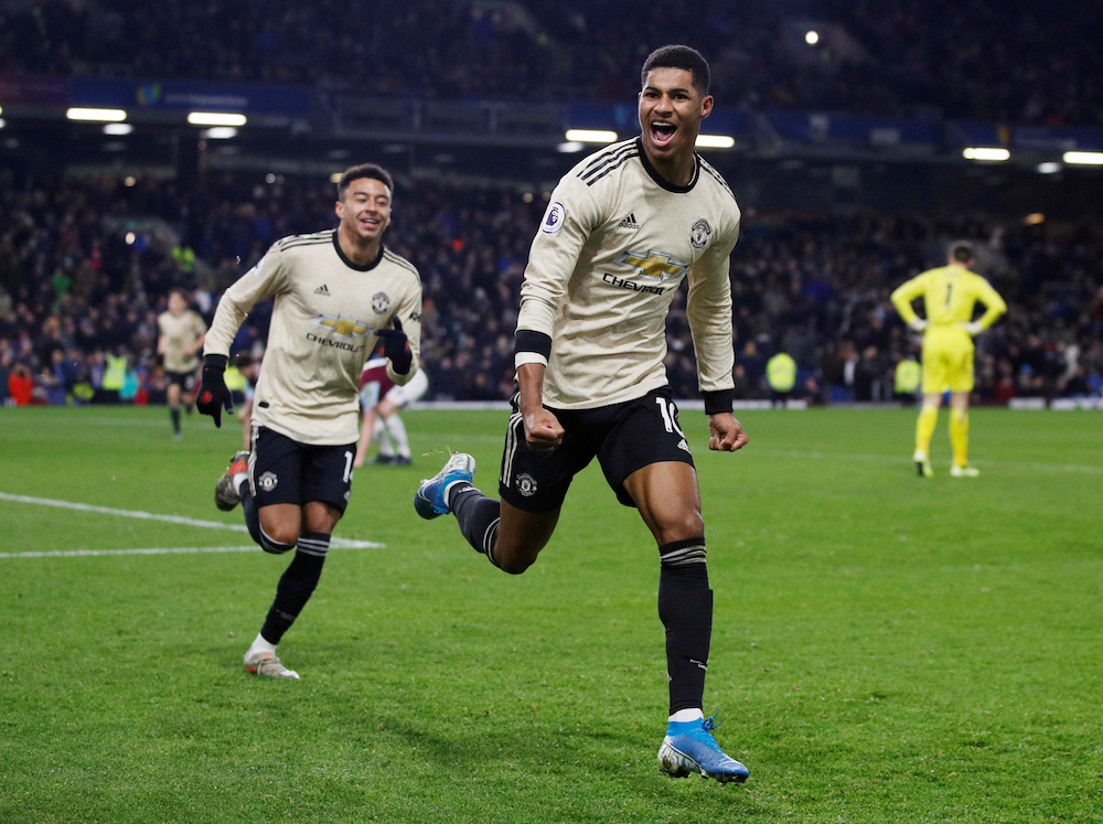 Manchester Unitedu00e2u20acu2122s Marcus Rashford celebrates scoring their second goal with Jesse Lingard during the Premier League match with Burnley at Turf Moor in Burnley December 28, 2019. u00e2u20acu201d Reuters pic