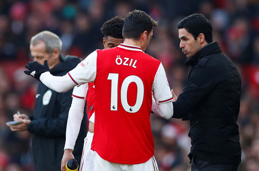 Arsenal manager Mikel Arteta with Mesut Ozil during the Premier League match with Chelsea at Emirates Stadium in London December 29, 2019. u00e2u20acu201d Reuters pic