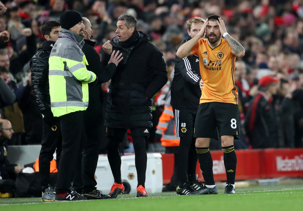 Wolverhampton Wanderersu00e2u20acu2122 Ruben Neves reacts after Liverpoolu00e2u20acu2122s Sadio Mane scored their first goal during their Premier League match at Anfield in Liverpool December 29, 2019. u00e2u20acu201d Action Images pic via Reuters