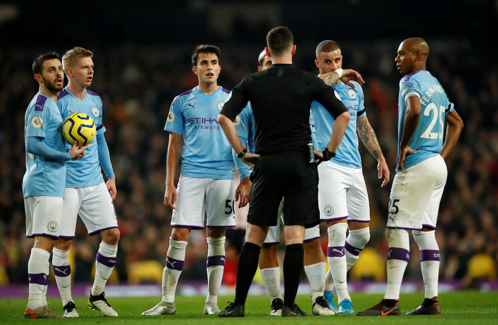 Manchester City’s Sergio Aguero and teammates argue with referee Chris Kavanagh during the Premier League match with Sheffield United at Etihad Stadium in Manchester December 29, 2019. — Action Images pic via Reuters