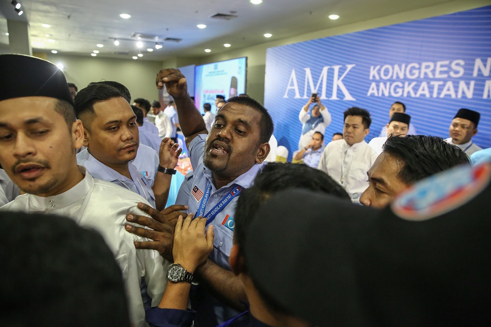 Chaos erupted at the opening ceremony of the PKR Youth National Congress opening at the Classic Ballroom at MITC in Melaka December 6, 2019. — Picture by Yusof Mat Isa