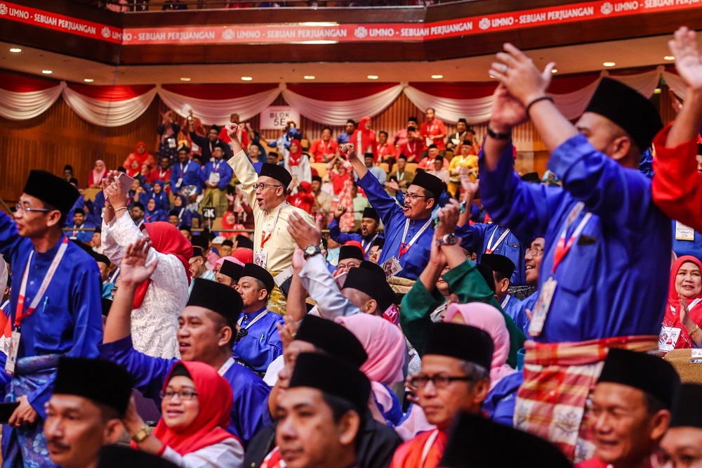 Delegates attend the 2019 Umno General Assembly at Putra World Trade Centre in Kuala Lumpur December 7, 2019. u00e2u20acu201d Picture by Firdaus Latif