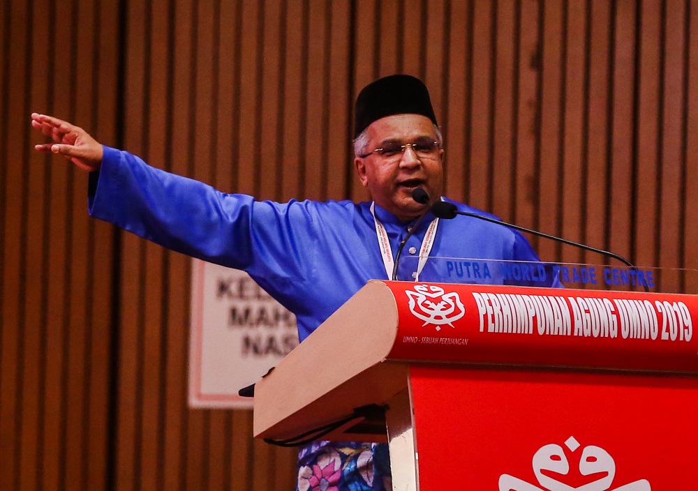 Bukit Gelugor division chief Datuk Omar Faudzar speaks during the Umno Annual General Assembly in Kuala Lumpur December 7, 2019. u00e2u20acu201d Picture by Firdaus Latif