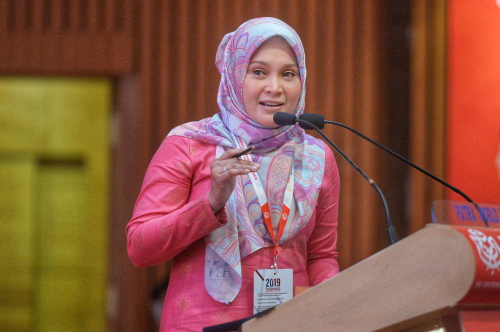 Puteri Umno representative Datin Naszriah Ngasri speaks during the Umno General Assembly 2019 at Putra World Trade Centre (PWTC) in Kuala Lumpur December 7, 2019 u00e2u20acu201d Picture by Shafwan Zaidon