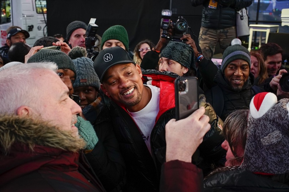 Actor Will Smith poses with fans at The Worldu00e2u20acu2122s Big Sleep Out event in Time Square in New York December 7, 2019. u00e2u20acu201d AFP pic