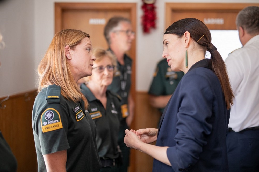 New Zealand's Prime Minister Jacinda Ardern (right) meets with first responders that helped those injured in the White Island volcano eruption the day before, at the Whakatane Fire Station in Whakatane December 10, 2019. u00e2u20acu201d AFP pic