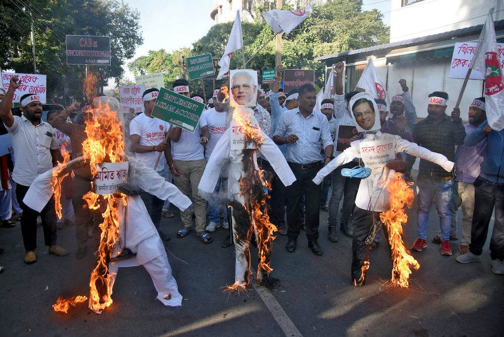 Activists from the All Assam Students Union (AASU) burn effigies during a protest against the Citizenship Amendment Bill in Guwahati, India, December 4, 2019. u00e2u20acu201d Reuters picn n
