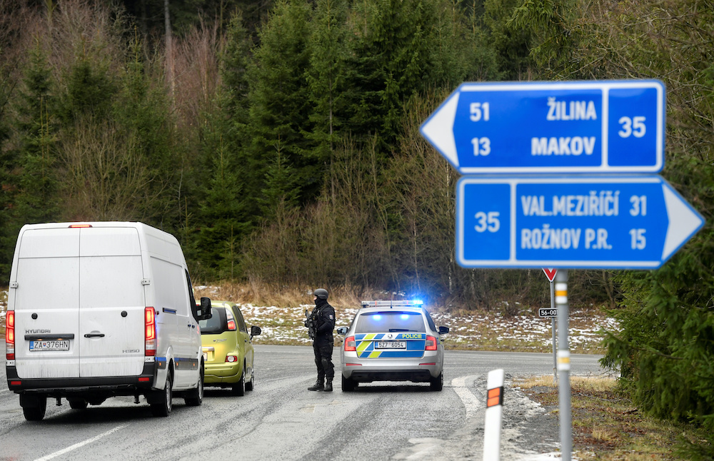 A police officer is seen at a road blockade, as police checks cars after a shooting at Ostrava's University Hospital, near the Slovak-Czech border crossing in Bila, Czech Republic, December 10, 2019. u00e2u20acu201d Reuters pic