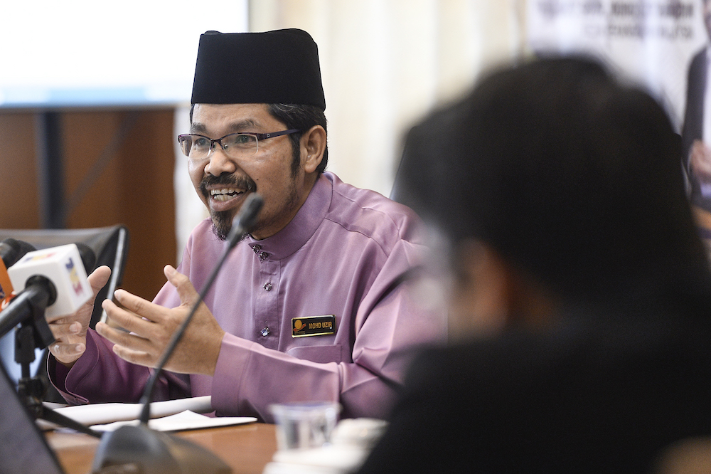 Statistics Department chief Datuk Seri Mohd Uzir Mahidin speaks during the launch of the 2018 Graduates Statistics in Putrajaya December 13,2019. u00e2u20acu201d Picture by Miera Zulyana