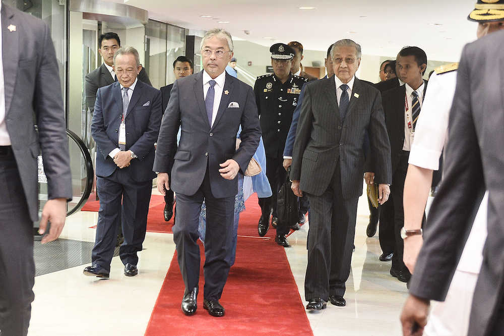 Yang di-Pertuan Agong Al-Sultan Abdullah Ri’ayatuddin Al-Mustafa Billah Shah and Prime Minister Tun Dr Mahathir Mohamad attend the Kuala Lumpur Summit 2019 December 19, 2019. — Picture by Miera Zulyana